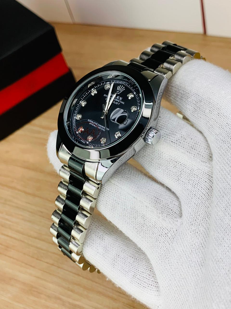 Rolex silver black stone